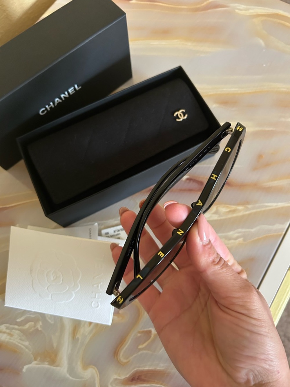 CHANEL Black Gloss Oval Sunglasses with Gold CC Temples - Picture 2 of 12